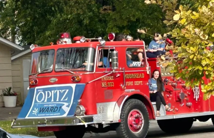 Moorhead City Council candidate Sarah Opitz’s use of fire truck during parade goes to a hearing — Rugby Government news